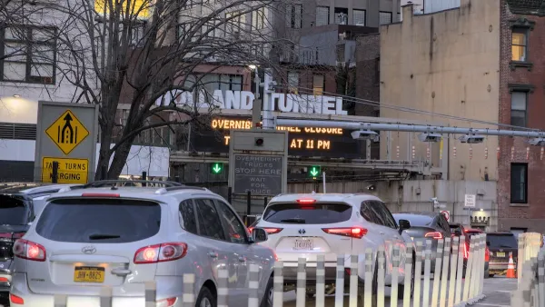Cars in traffic entering Holland Tunnel in New York City.